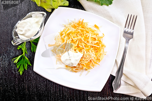 Image of Salad of carrot and kohlrabi with sour cream on board top