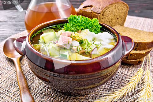 Image of Okroshka in clay bowl on napkin