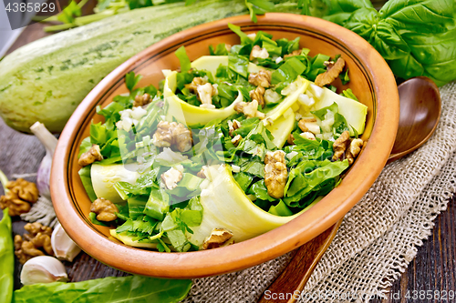 Image of Salad with squash and sorrel on board