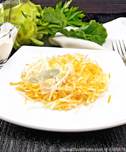 Image of Salad of carrot and kohlrabi on board