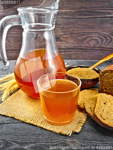 Image of Kvass in glassware on board