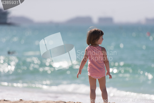 Image of little cute girl at beach