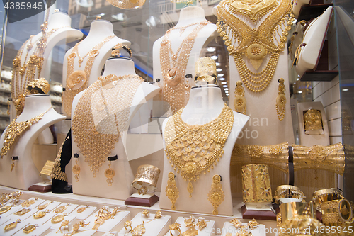 Image of gold jewelry in the shop window