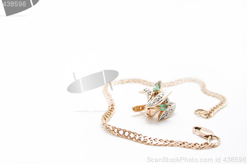 Image of Golden bracelet and ear rings