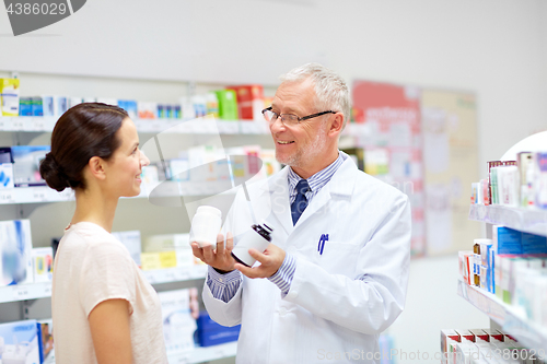 Image of apothecary and woman with drug at pharmacy