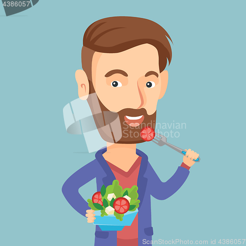 Image of Man eating healthy vegetable salad.