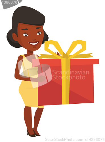 Image of Joyful african woman holding box with gift.