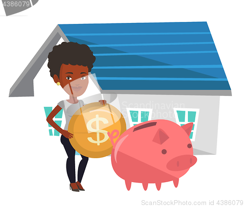 Image of Woman puts money into piggy bank for buying house.