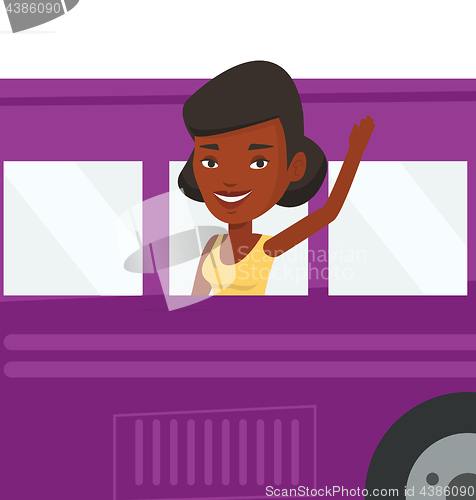 Image of Woman waving hand from bus window.