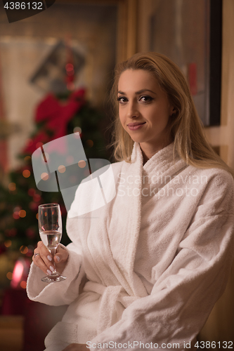 Image of woman drinking champagne at spa