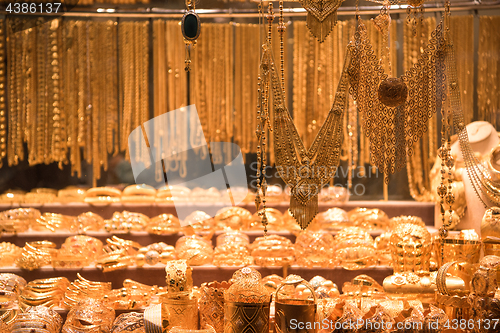 Image of gold jewelry in the shop window