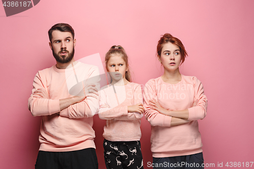 Image of The sad family on pink