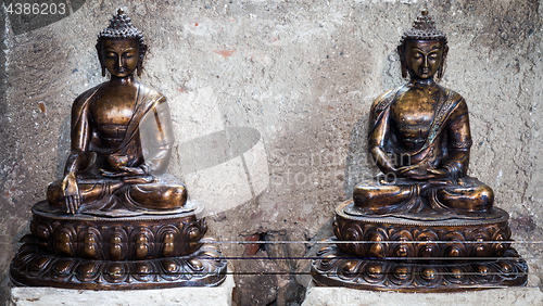 Image of Meditating Buddha Statues couple