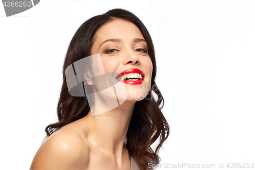 Image of beautiful smiling young woman with red lipstick