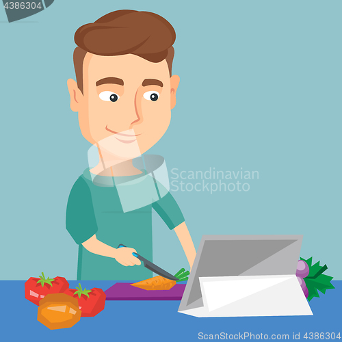 Image of Man cooking healthy vegetable salad.