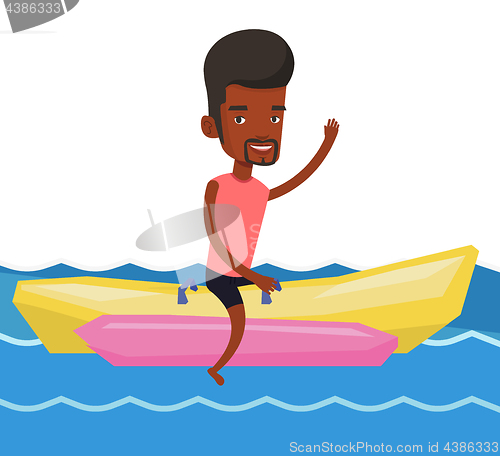 Image of Tourists riding a banana boat vector illustration.