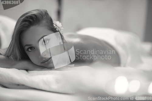 Image of woman laying on massage table