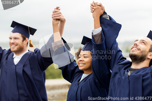 Image of happy students celebrating graduation