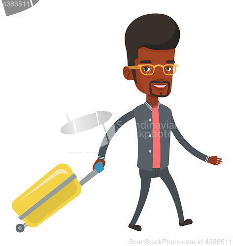 Image of African man walking with suitcase.