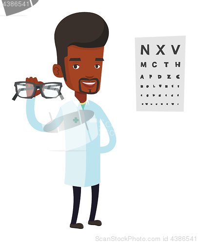 Image of Professional ophthalmologist holding eyeglasses.