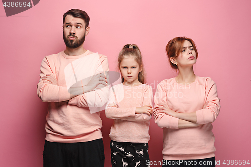 Image of The sad family on pink