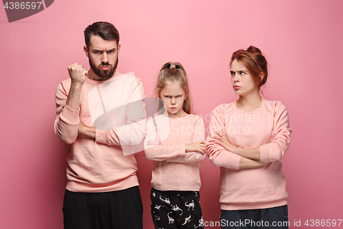 Image of The sad family on pink