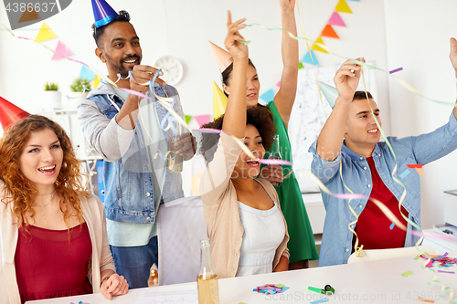 Image of happy team having fun at office party