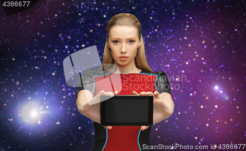 Image of futuristic woman with tablet pc over space