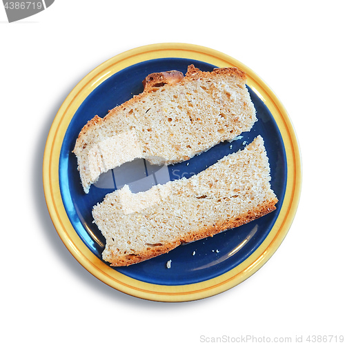 Image of a slice of bread broken in two pieces