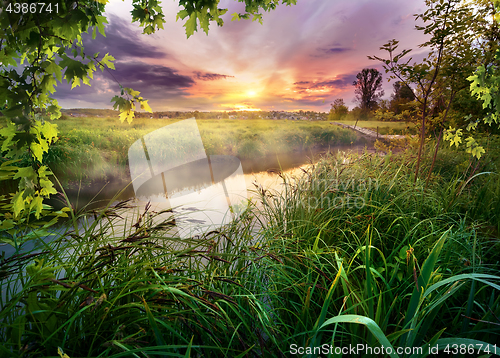 Image of Colorful sunrise on river