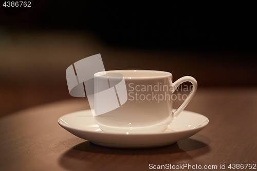 Image of Coffee cup on table