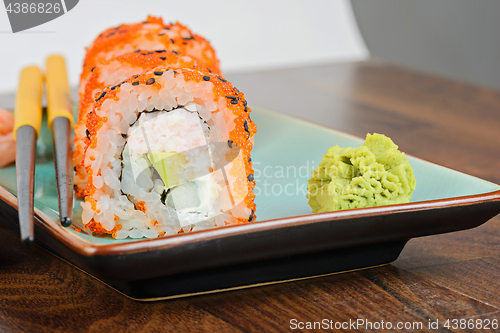 Image of California maki sushi with masago and ginger