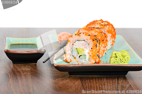 Image of California maki sushi with masago and ginger