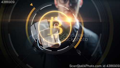 Image of close up of businessman with bitcoin hologram