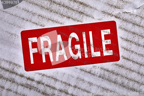 Image of Fragile stamp closeup