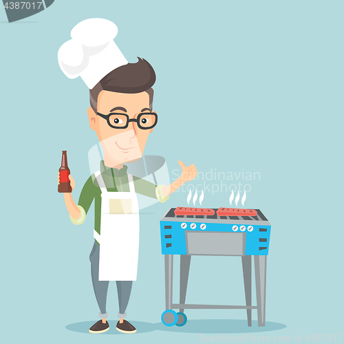Image of Man cooking steak on barbecue grill.