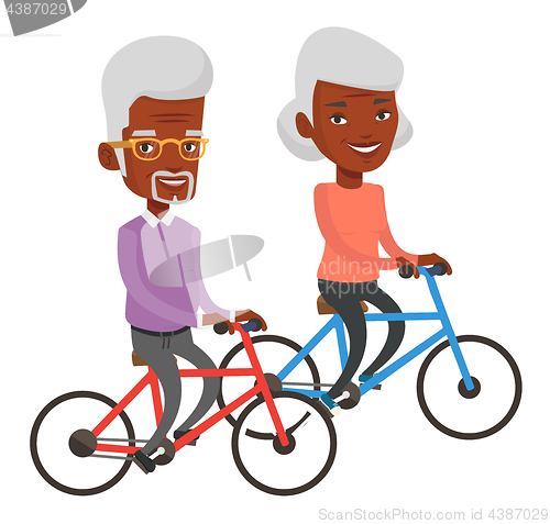 Image of Senior couple riding on bicycles.