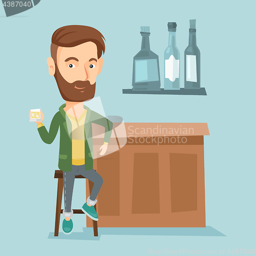 Image of Smiling man sitting at the bar counter.