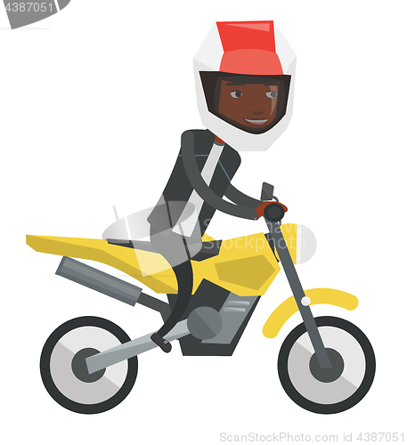 Image of Young african-american man riding motorcycle.