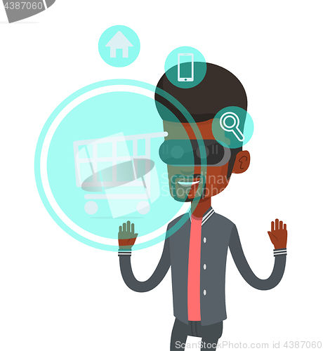 Image of Man in virtual reality headset shopping online.