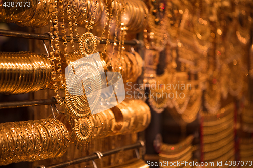 Image of gold jewelry in the shop window