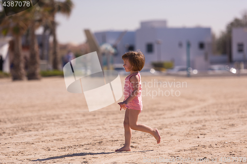 Image of little cute girl at beach