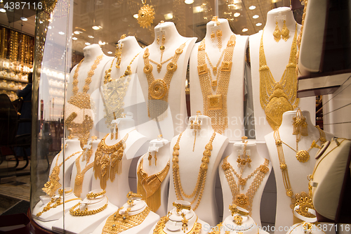 Image of gold jewelry in the shop window