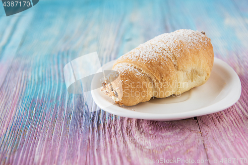 Image of Tasty eclair on plate