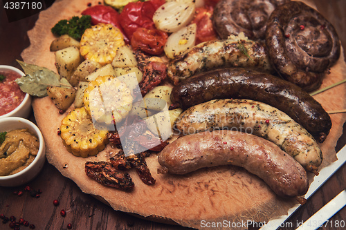 Image of Grilled sausages with vegetables