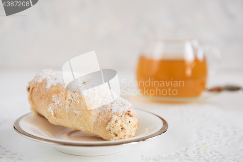 Image of Tasty eclair on plate