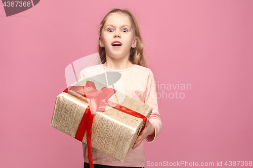 Image of picture of happy little girl with gift box