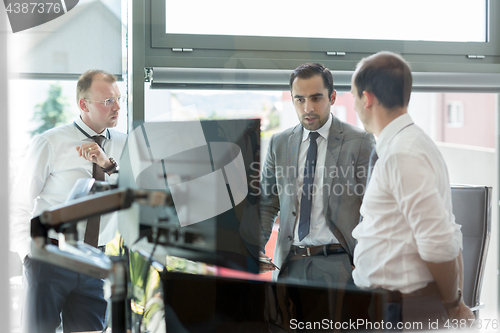 Image of Corporate businessteam working in modern office.