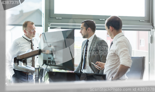 Image of Corporate businessteam working in modern office.