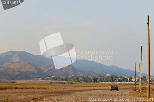 Image of Serene landscape with road in natural park,